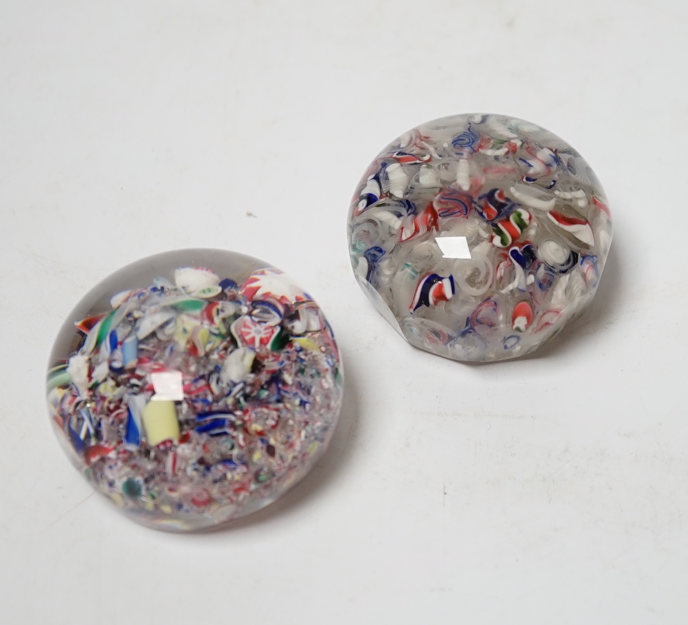 Two French ‘scrambled’ glass paperweights, 6cm diameter